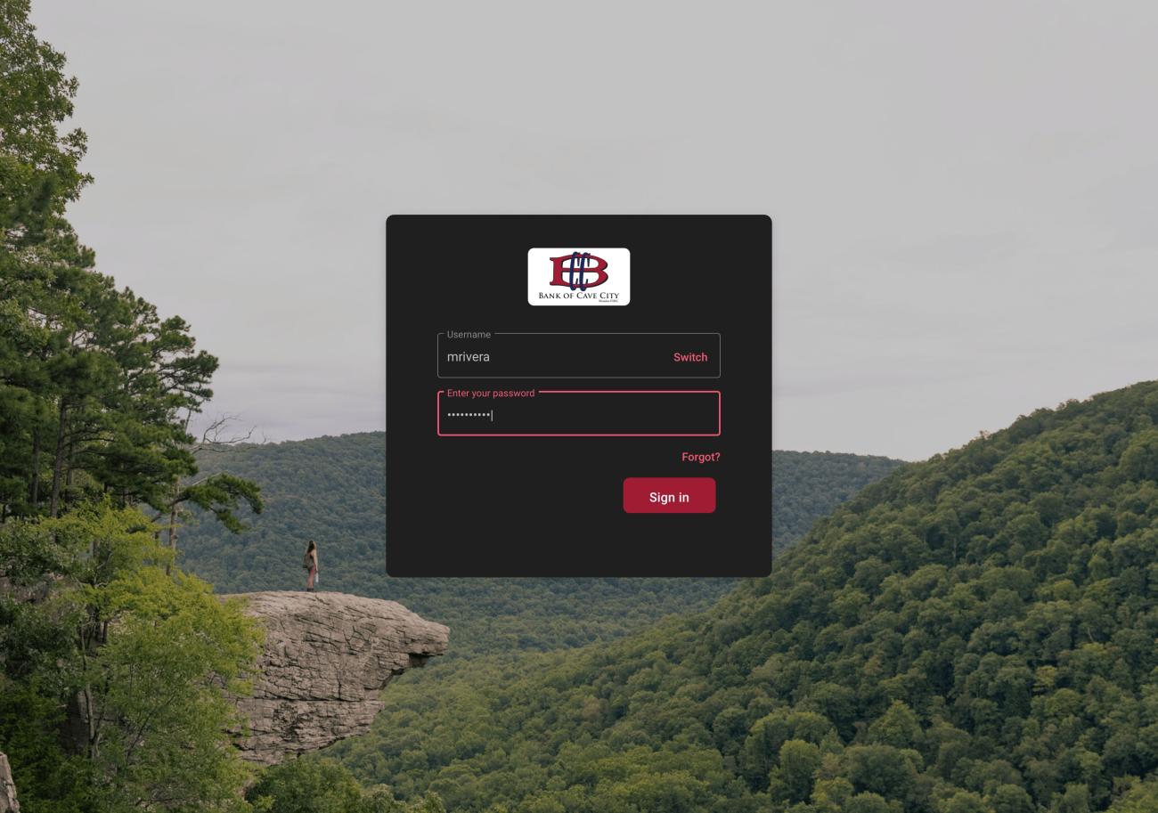 photo of a login screen with username and password and the Bank of Cave City logo